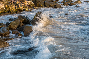 Sea wave crashing on a coast stones. Poti, Georgia