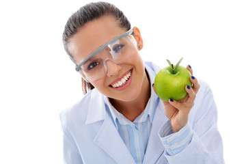 Dentist medical doctor woman hold green fresh apple in hand and tooth brush. Dentist doctors. Woman...