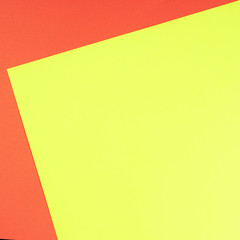 Color papers geometry flat composition background with yellow and red tones