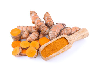 Turmeric roots and turmeric powder isolated on white background