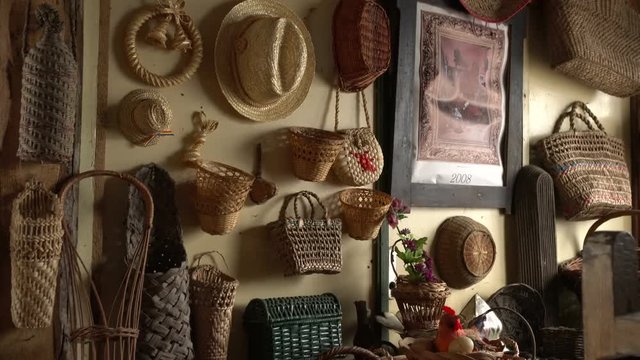 Straw objects hanged on wall 