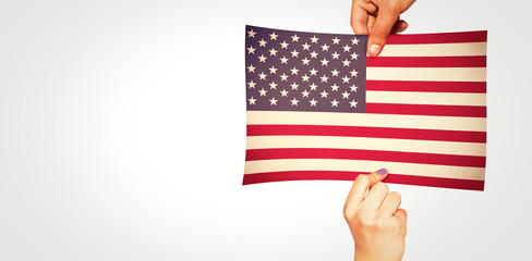 Hands showing against usa national flag