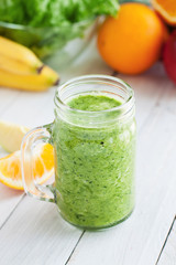Health smoothie with green kale, apple and banana