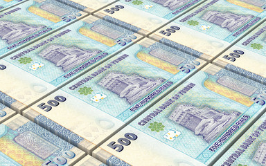 Yemeni rials bills stacked background. 3D illustration.