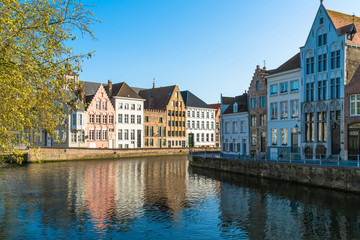 View of a canal and old historical buildings in Bruges, Belgium