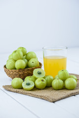 Indian gooseberry on wooden table