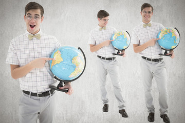 Nerd with globe against white and grey background