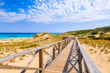 Walkway on sand dunes to Cala Mesquida beach, Majorca island, Spain