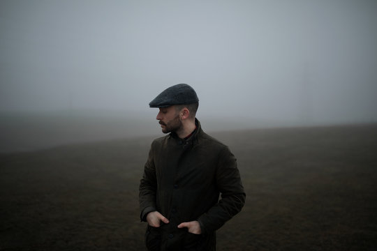 Man in foggy field