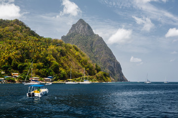 A View of Petit Piton and Boats in a Harbor, in St. Lucia
