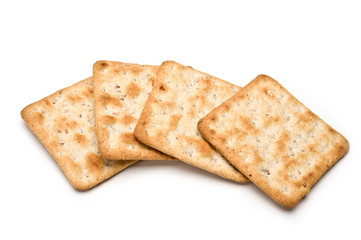 Tasty crackers on white background.