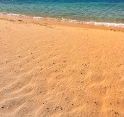 Coast. Waves and sand.