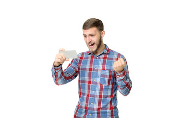 Young man holding smartphone on white background