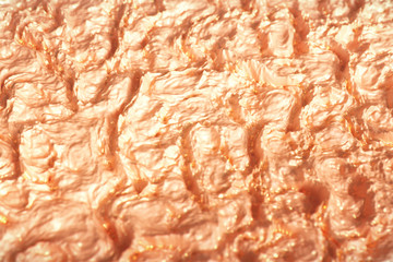 Close-up of wrinkles in senior citizen's skin,wrinkle fleshcolor abstract background.