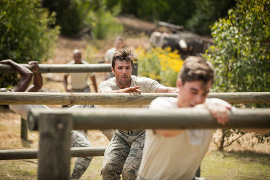 Military soldiers training on fitness trail