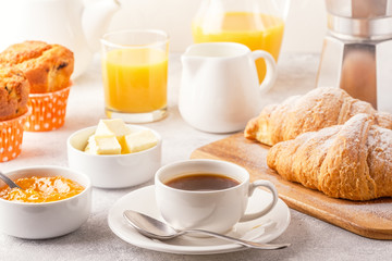 Continental breakfast with fresh croissants, orange juice and coffee