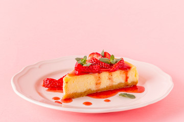 Delicious homemade cheesecake with strawberries.