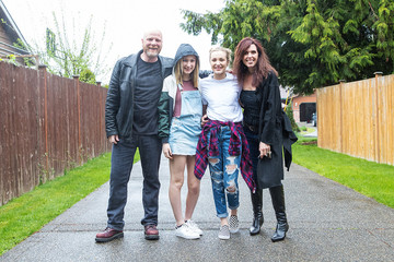 Fototapeta premium Happy Family Outside in the rain