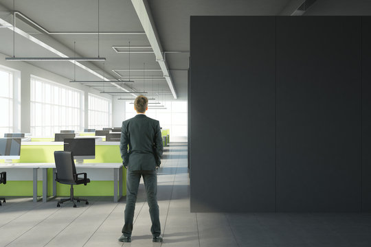 Man in modern office with copyspace