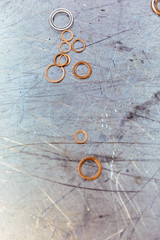 Washers on a metal plate
