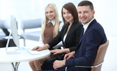 closeup of business people sitting at a meeting the conference room.