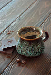 Cup of Black Coffee , Chokolate and Coffee Beans