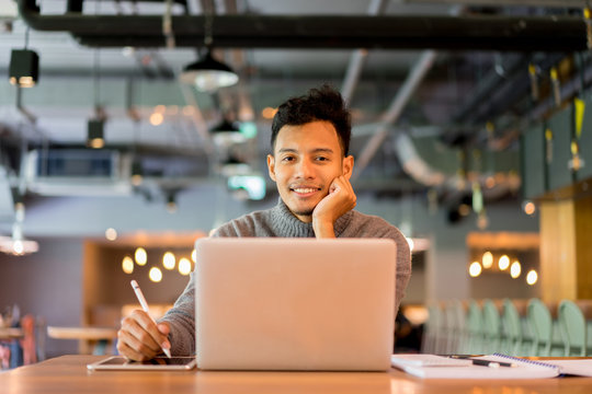 Close Up Asian Designer Creative Man Working With Laptop At Loft Office 