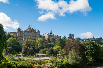 View of the old town and Museum on the Mound and Waverley station roof, seen from Princes Street Gardens, Edinburgh, Scotland.