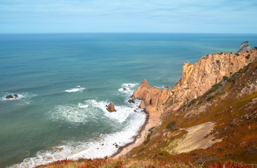 Fototapeta na wymiar Peaceful oceanic landscape with rocks and waves