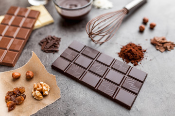 Delicious variety of chocole on rustic background