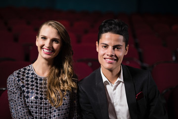 Couple watching movie in theatre