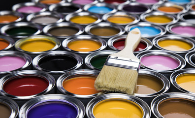 Colorful paint cans with paintbrush - 202810352