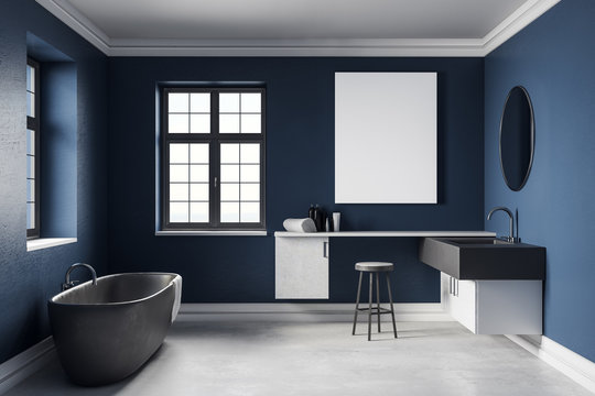 Modern blue bathroom with empty poster
