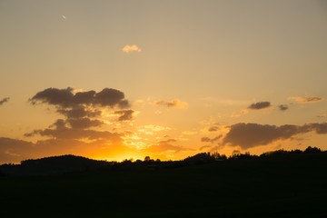 Sunset on meadow with hills and tree. Slovakia