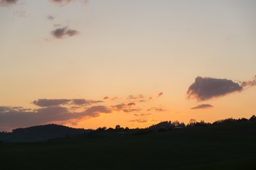 Sunset on meadow with hills and tree. Slovakia