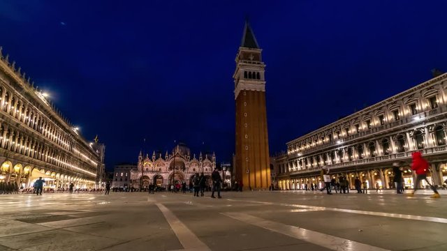 Piazza San Marco and Basilica of St Mark night timelapse. It is cathedral church of Roman Catholic Archdiocese of Venice. Tourists walking in front of it. 4K