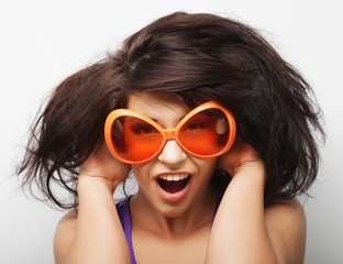 Fototapeta premium lifestyle and people concept: fashion girl with big sunglasses 