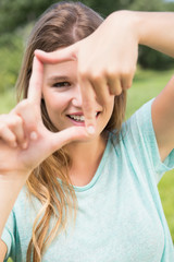 Fototapeta premium Pretty blonde smiling at camera