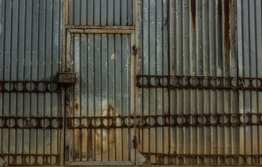 abstract metal industrial concept door and fence in old factory