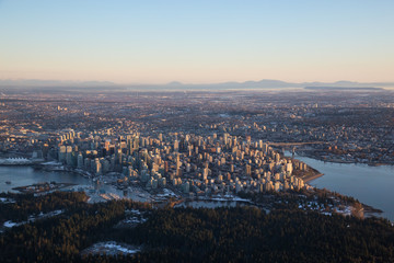 Aerial view of Downtown City during a vibrant sunset. Taken in Vancouver, British Columbia, Canada.