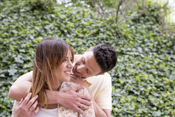 Young Happy Couple Posing in the park