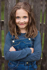 outdoor spring portrait of beautiful young brunette girl with long hair 