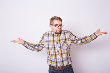 Young emotional surprised, frustrated and bewildered man. Human emotions, facial expression concept on white background.