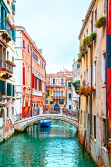 Fotobehang Narrow canal in Venice © Roman Sigaev