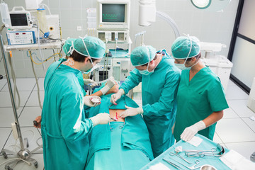 High angle view of surgeon operating in an operating theater