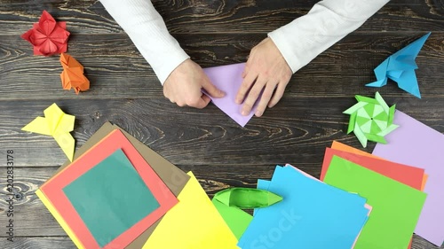 Man Folding Paper To Make Origami Lesson Of Japanese Art