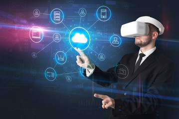 Businessman in vr glasses organize lifesize projected social media concept
