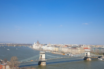 Fototapeta na wymiar Panorama of Budapest with the Hungarian Parliament (orszaghaz) seen from the Budapest castle, the Danube river being in front with the Szechenyi bridge in front