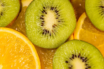 Background of the kiwi and orange fruits © ihorbondarenko