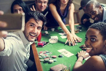 Group of people playing gambling together
